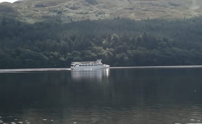 boat crossing a lake